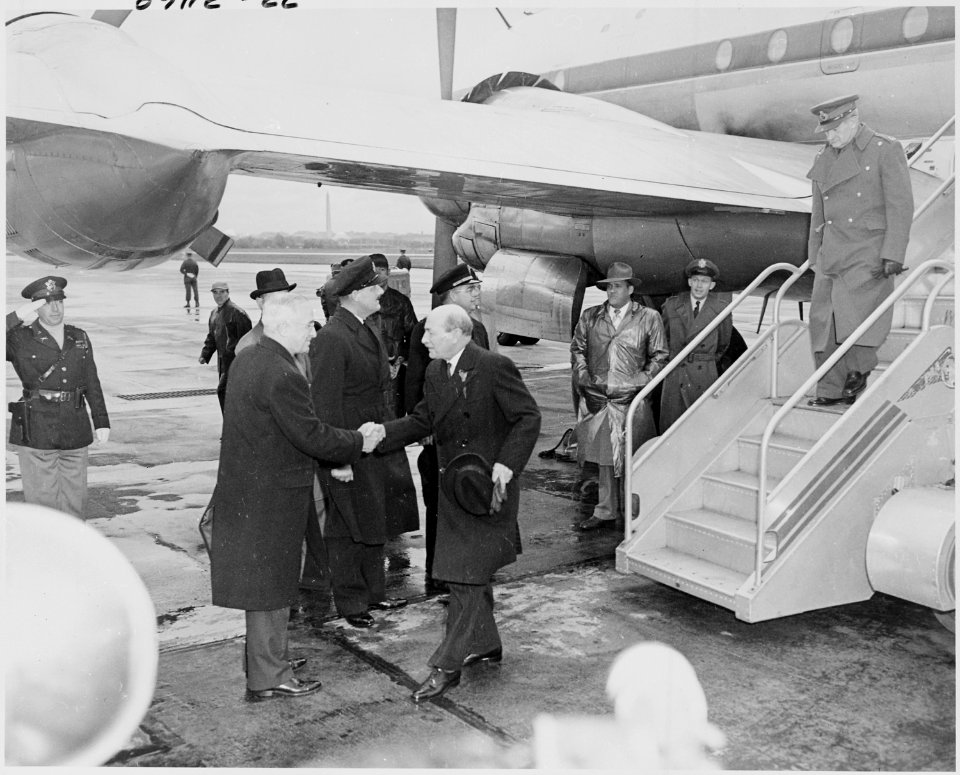 Photograph of President Truman greeting British Prime Minister Clement Attlee at Washington National Airport, upon... - NARA - 200257