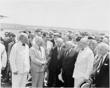 Photograph of President Truman shaking hands with Secretary of State James Byrnes just before Byrnes's departure for... - NARA - 199414