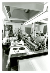 Physicist Laurence Andrews of the Energy Utilization Section monitors a variety of ranges to test their energy efficiency photo