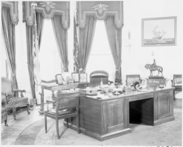 Photograph of President Truman's desk in the Oval Office of the White House. - NARA - 199451