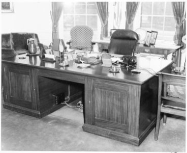 Photograph of President Truman's desk in the Oval Office of the White House. - NARA - 199454 photo