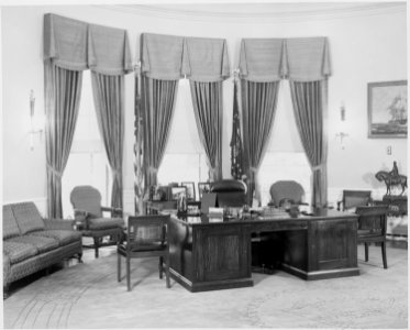 Photograph of President Truman's desk in the Oval Office of the White House. - NARA - 199462 photo