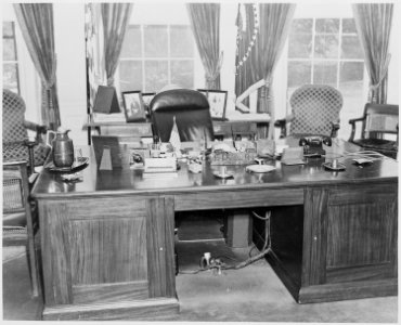 Photograph of President Truman's desk in the Oval Office of the White House. - NARA - 199473 photo