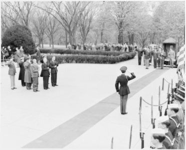 Photograph of President Truman, Secretary of the Navy James Forrestal, and other dignitaries saluting the Tomb of the... - NARA - 199435