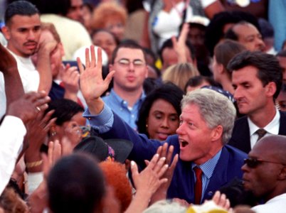 Photograph of President William Jefferson Clinton Greeting People in a Large Crowd at a Get Out the Vote Rally in Los Angeles, California, 11 02 2000 (cropped)