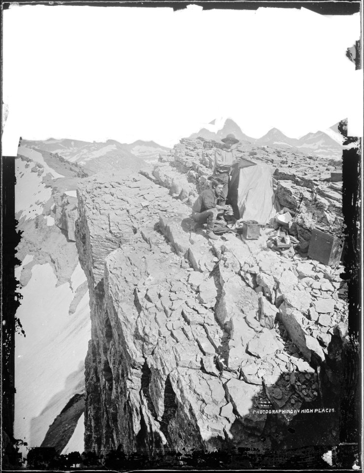 Photographing in high places. Lincoln County, Wyoming. William Henry Jackson and Charly Campbell in picture. - NARA - 516781