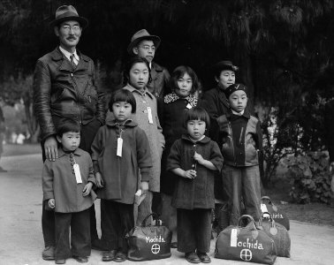 Photograph of Members of the Mochida Family Awaiting Evacuation - NARA - 537505