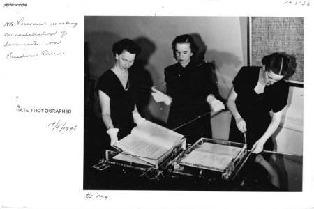 Photograph of National Archives Personnel Working on Installation of Documents on the Freedom Train