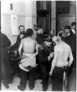 Physicians examining a group of Jewish immigrants LCCN2012646350