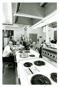 Physicist Laurence Andrews of the Energy Utilization Section monitors a variety of ranges to test their energy efficiency2 photo