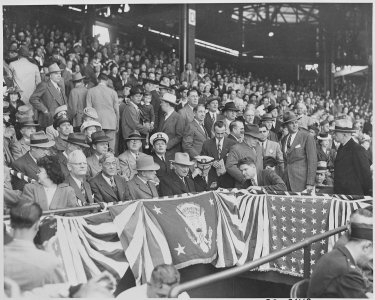 Photograph of President Truman and other officials at Griffith Stadium in Washington for the opening game of the... - NARA - 199574 photo