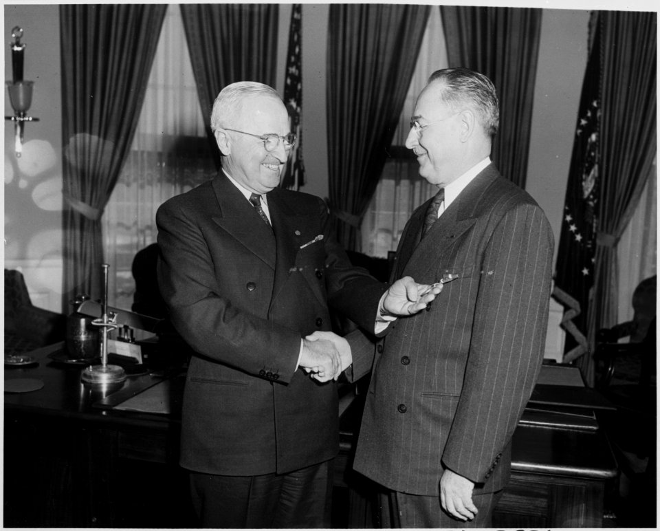 Photograph of President Truman in the Oval Office presenting the Distinguished Service Medal to Rear Admiral Sidney... - NARA - 200402