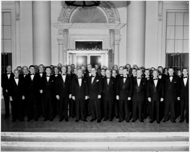 Photograph of President Truman outside the White House with his Little Cabinet, the top officials of the... - NARA - 200410