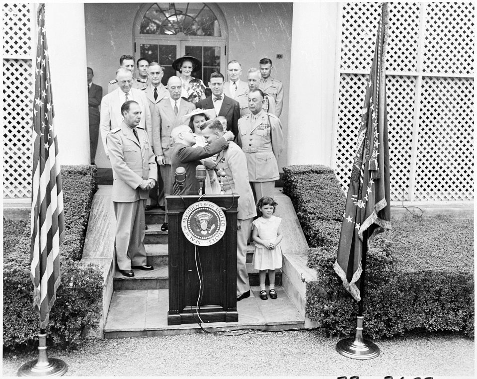 Photograph of President Truman presenting First Lt. Henry Commiskey of the U.S. Marine Corps with the Medal of Honor... - NARA - 200326