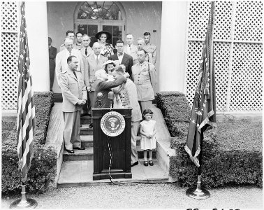 Photograph of President Truman presenting First Lt. Henry Commiskey of the U.S. Marine Corps with the Medal of Honor... - NARA - 200326