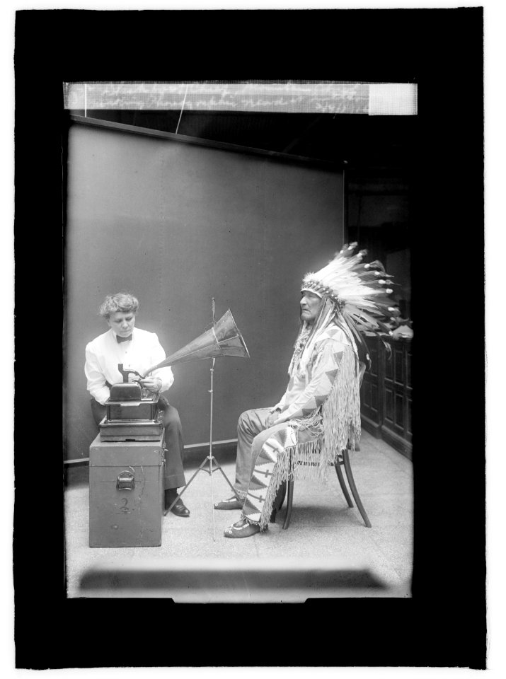 Piegan Indian, Mountain Chief, listening to recording with ethnologist Frances Densmore LCCN2016844693