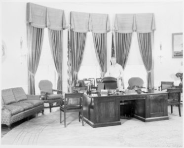 Photograph of President Truman's Oval Office at the White House. - NARA - 199443 photo