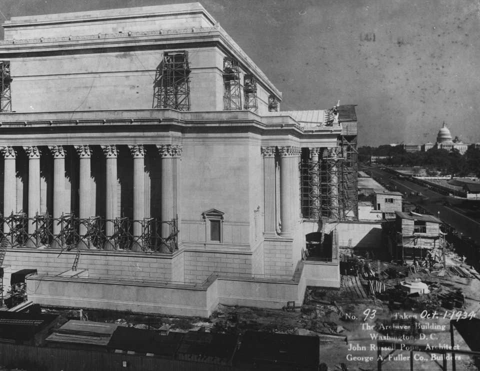 Photograph of the Almost Complete Construction of the Exterior and the Adding of Details and Sculptures to the National Archives Building, Constitution Avenue Entrance, Washington, D.C. (36378754140)