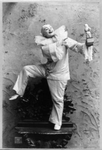 Pilar Morin as clown-mime- full lgth., standing on left foot, facing right LCCN2003662116