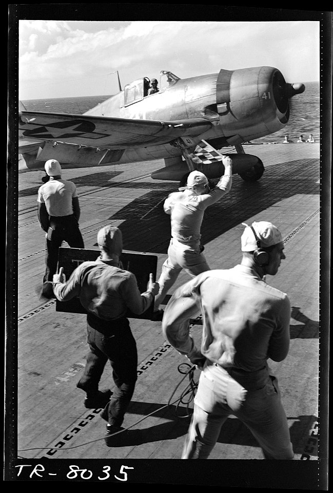 Pilot in F6F awaits the take-off signal on board the USS Lexington (CV-16). - NARA - 520900
