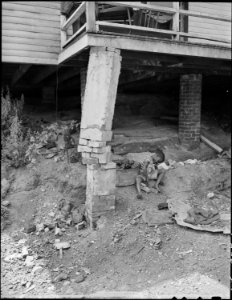 Pillar supporting porch of miner's home in company housing project. Mullens Smokeless Coal Company, Mullens Mine... - NARA - 540939 photo