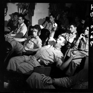 Pilots at briefing session aboard USS Lexington (CV-16) prior to attack on Kwajalein. - NARA - 520881