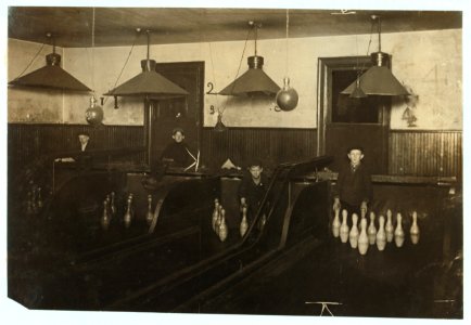 Pin-boys in a Pittsburgh Bowling Alley. They work until late at night. LOC nclc.05460