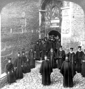 Pious monks of the Eastern Orthodox Church at door of Megaspelaeon monastery, Greece
