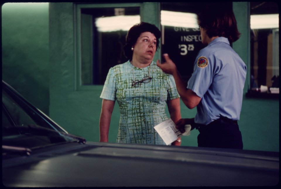 Public Works Department Employee at an Auto Emission Inspection Station in Norwood, Ohio...08-1975 (4265785725)