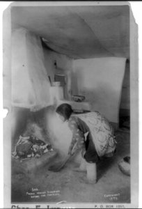 Pueblo Woman Sweeping Before the Fireplace LCCN2006684453