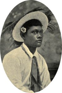 Pure caste Tahitian boy, with straw hat and tie, by Coulon photo