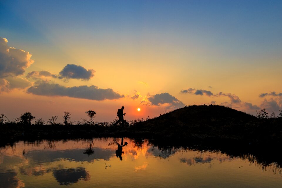 Sunrise hiker sillhouette