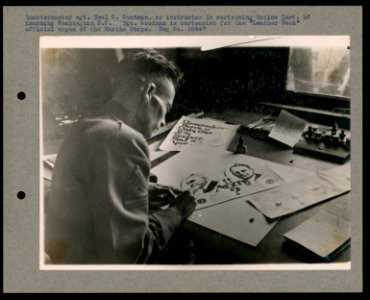 Quartermaster sgt. Neal C. Goodman, an instructor in cartooning Marine Inst. of Learning Washington, D.C. Sgt. Goodman is cartoonist for the Leather Neck official organ of the Marine Corps LCCN2016645660