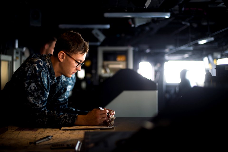 Quartermaster Seaman Demitrius Wolak makes deck log entries. (16592907973)