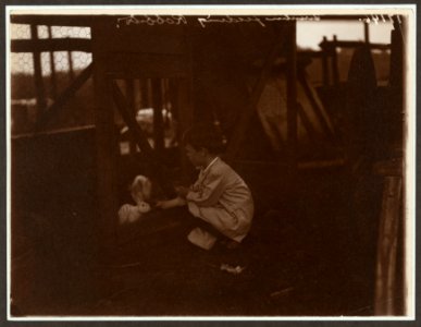 Quentin Roosevelt feeding the rabbits LCCN2009633590