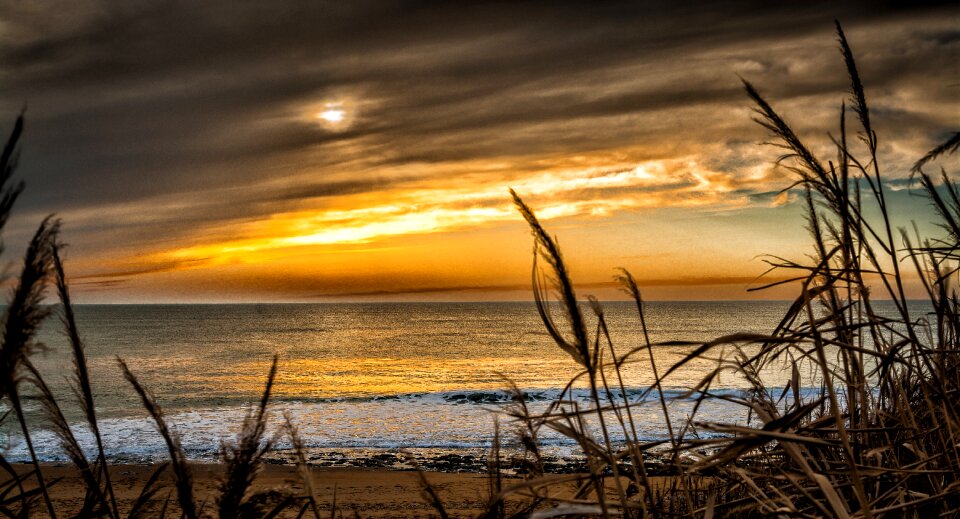 Sea sunset sand photo