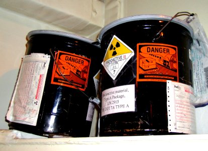 Radioactive HAZMAT labels on navy containers photo