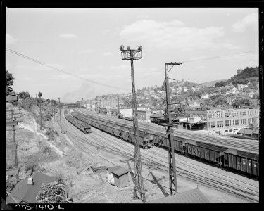 Railroad tracks, empty coal cars in the yard. Bluefield, Mercer County, West Virginia. - NARA - 540786