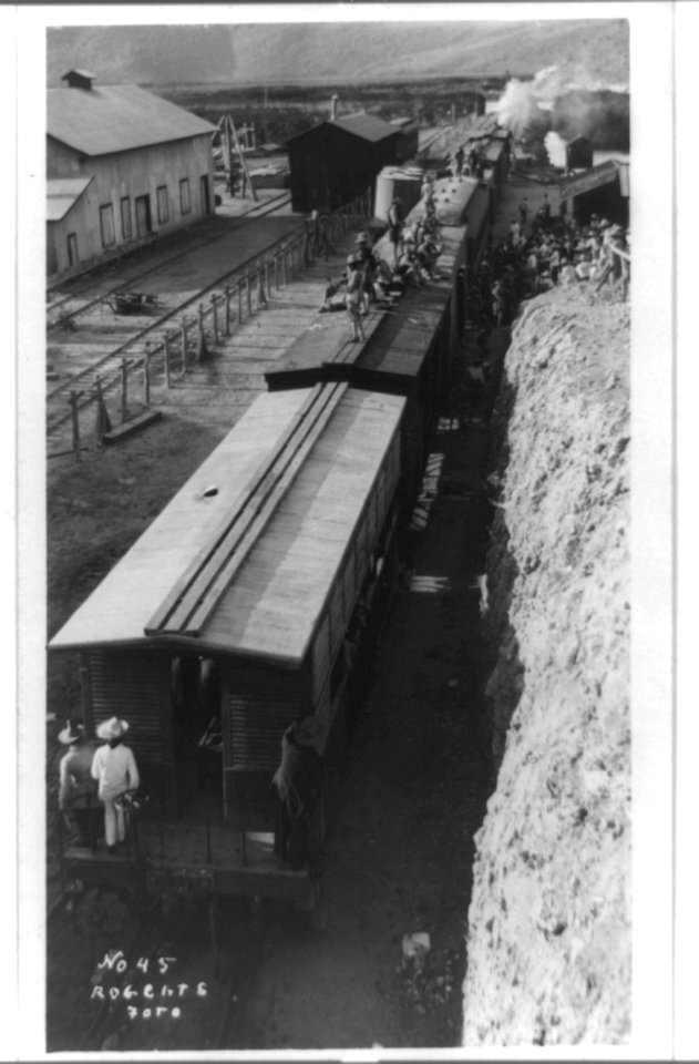 Railroad trains transporting Insurrectos during the Mexican Revolution- Bird's-eye view from back of train LCCN2002718458