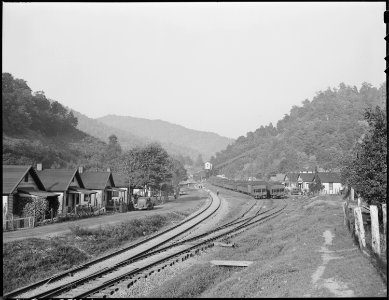 Railroad yards. Company housing project, and tipple. Black Mountain Corporation, 30-31 Mines, Kenvir, Harlan County... - NARA - 541277 photo