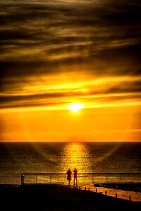 Sea sunset sand photo