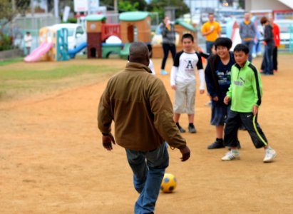 Playing soccer 140307-N-EP471-303