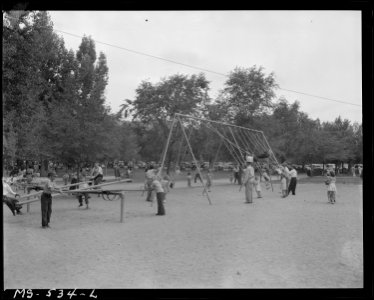 Playground at City Park. Price, Carbon County, Utah. - NARA - 540475 photo
