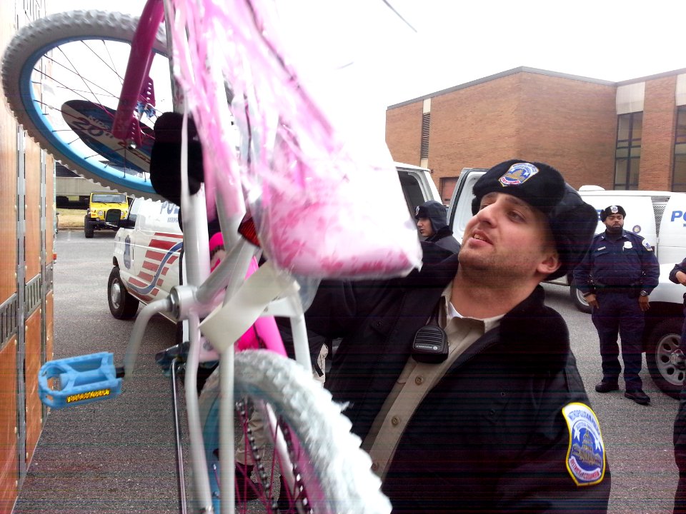 Police cadets help distribute Toys for Tots bicycles 131217-N-CG900-003