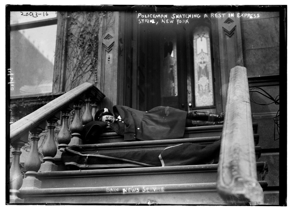 Policeman snatching a rest in express strike, New York LCCN2014688660