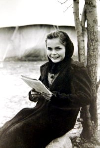 Polish refugee girl studying school lesson at evacuee camp, Iran, 1943 (35562872053)