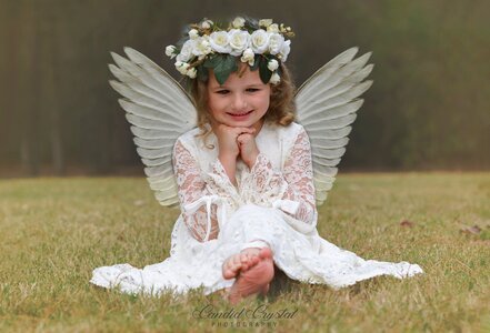 Girl angel wings flower crown photo