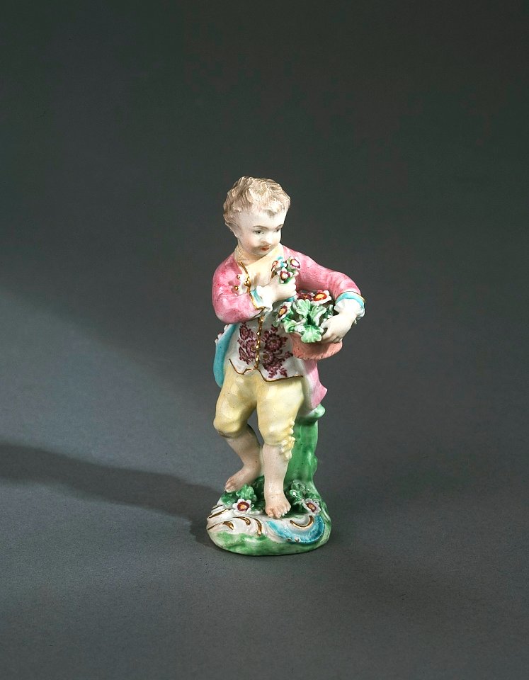 Porslin. Figurin - gosse med blomsterkorg - Hallwylska museet - 89291