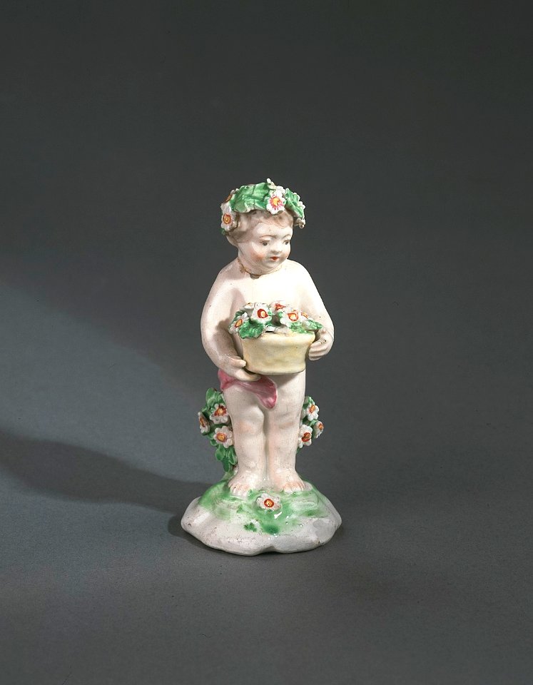Porslin. Figurin - Putti med blommor - Hallwylska museet - 89292