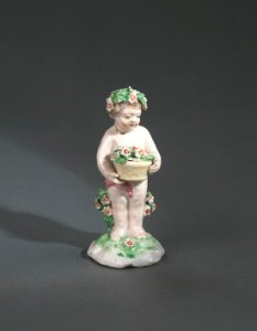 Porslin. Figurin - Putti med blommor - Hallwylska museet - 89292